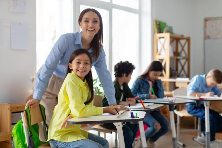 An educational assistant training program graduate gaining experience in a K&ndash;12 school setting