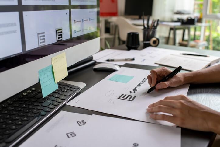 A graphic designer working on layout and typography